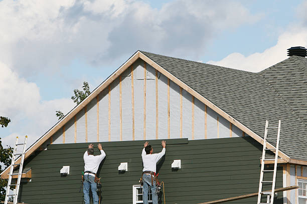 Professional Siding Installation technician working in Herminie, PA